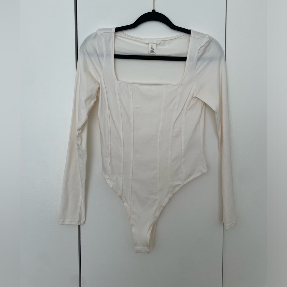 Cream body suit